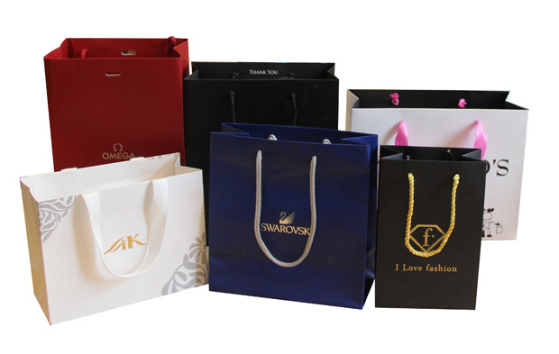  Custom Fancy Logo Printed Shopping Paper Carrier Bags Manufactures