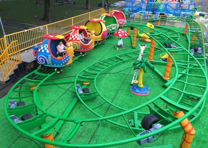  Mini Snail Shape UFO Roller Coaster Customized Height With Chain Lift Structure Manufactures