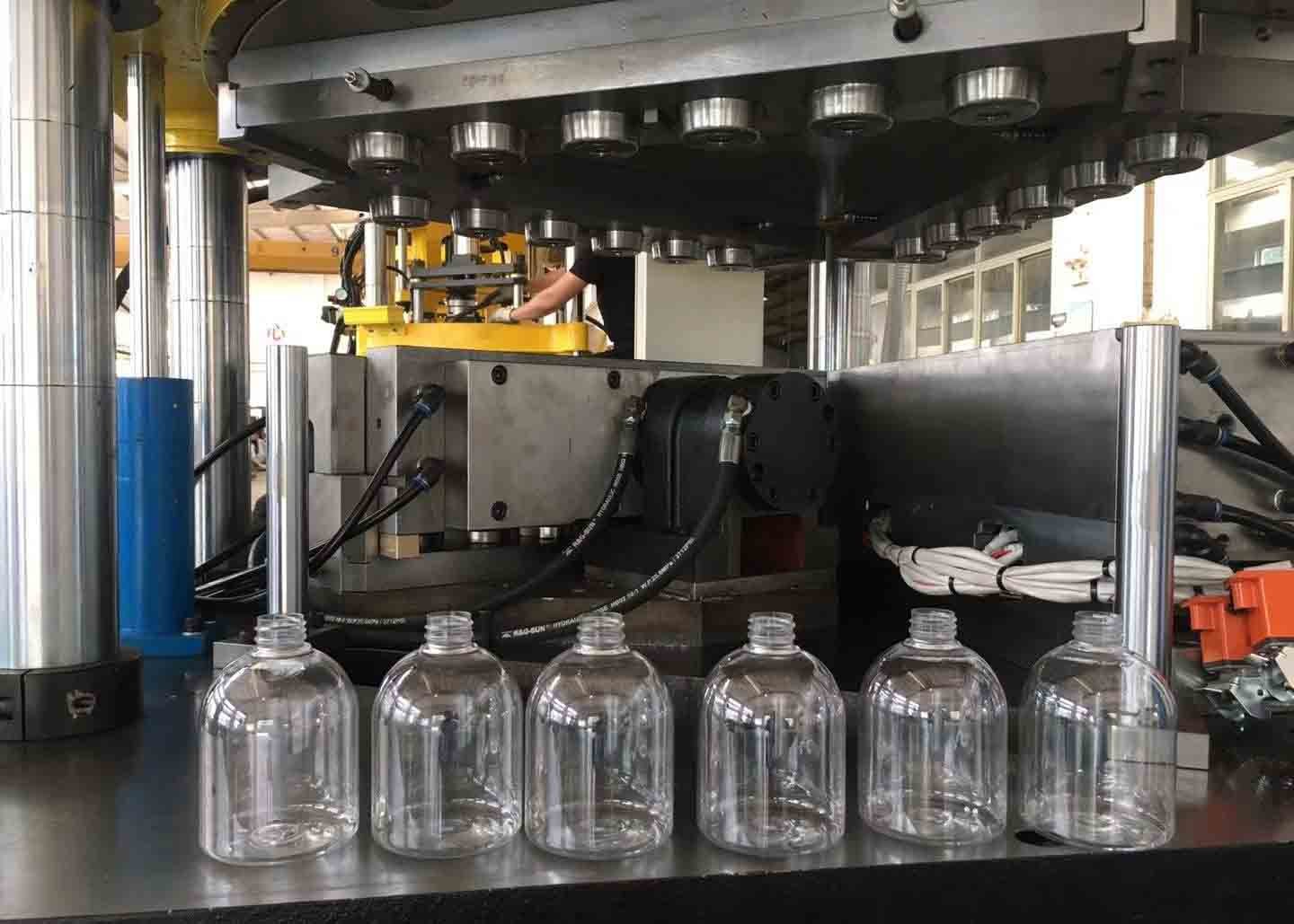  100ml 200ml Complete Bottled Water Production Lines PETG Bottle Blow Molding Machine Manufactures