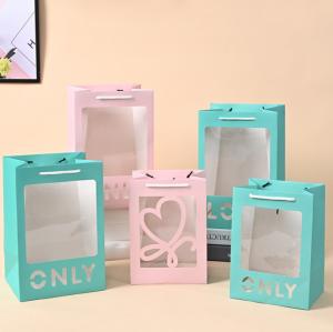 China Blue PVC Window Cardboard Gift Bags With Laser Cut Love Recyclable Tote With Handle on sale