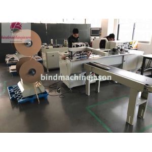 Automatic double o inserting machine with hole punching function for notebook