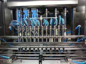  GNC 12L Viscous Liquid Filling Machine 33mm Cap Liquid Bottle Packing Machine Manufactures
