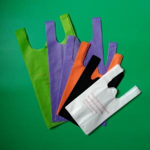 Biodegradable Non woven vest bag, black color, 30gsm, size 20+12x40cm,100% virgin, eco-friendly Manufactures