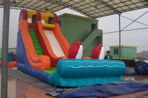  Rotating Large Inflatable Slide With Inflatable Trampoline Jumping Bouncer Manufactures