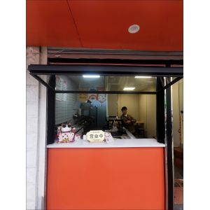 Wide-Format Folding Window Configuration Framing Mountain Vistas and Urban Skyline Views with Minimal Framework