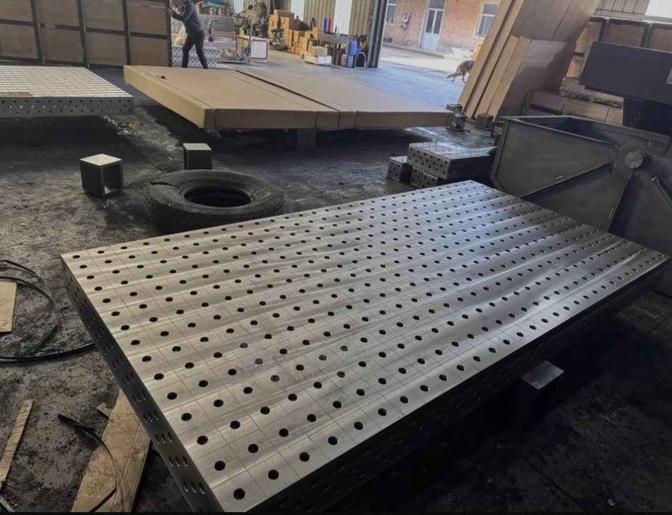 16 series heavy duty modular welding table with 5/8 hole pattern