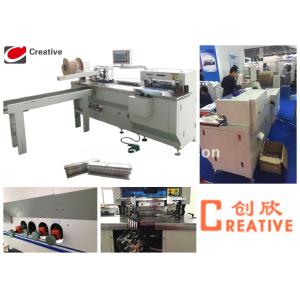 Automatic double o inserting machine with hole punching function for notebook